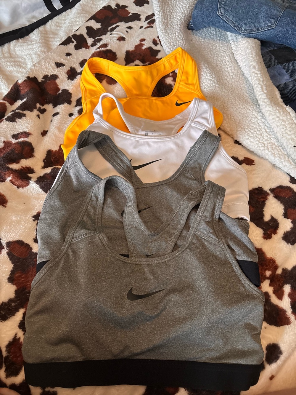 Nike Women's Racerback sports bras in Gray, White, Yellow size small